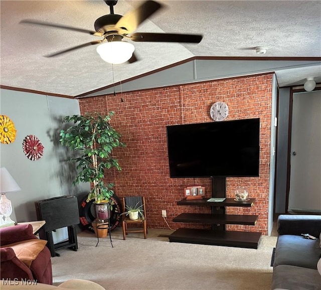 28 E Buddy St, New Franklin, OH 44203 - carpeted living area featuring a textured ceiling, vaulted ceiling, ceiling fan, brick wall, and crown molding