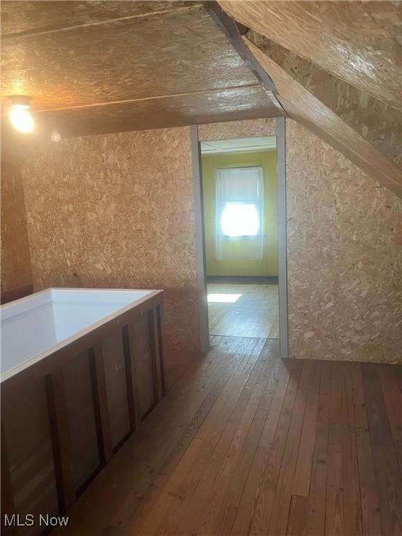 7718 Bertha Ave, Parma, OH 44129 - bonus room featuring hardwood / wood-style flooring and vaulted ceiling