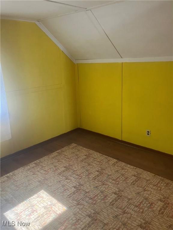7718 Bertha Ave, Parma, OH 44129 - bonus room featuring lofted ceiling and baseboards