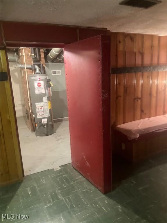7718 Bertha Ave, Parma, OH 44129 - unfinished below grade area with water heater