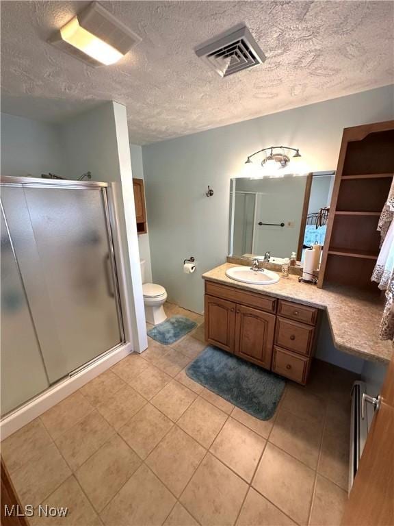 1684 Morris St, Mineral Ridge, OH 44440 - bathroom with vanity, a stall shower, tile patterned flooring, and a textured ceiling