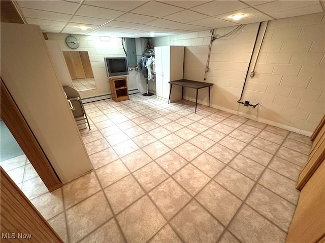 1684 Morris St, Mineral Ridge, OH 44440 - finished basement featuring a baseboard heating unit, electric panel, a drop ceiling, and concrete block wall