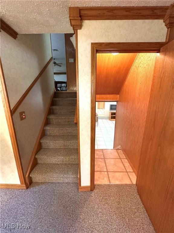 1684 Morris St, Mineral Ridge, OH 44440 - stairway featuring carpet flooring and a textured ceiling