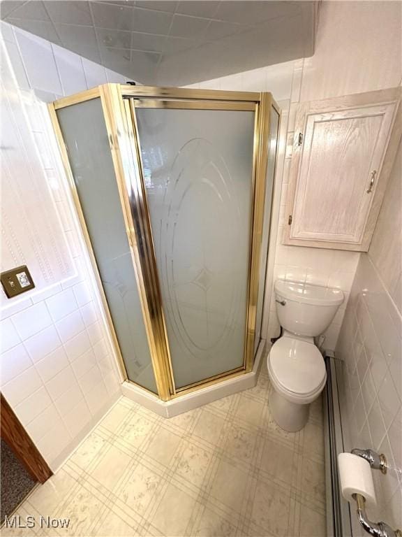 1684 Morris St, Mineral Ridge, OH 44440 - bathroom with a stall shower, tile patterned floors, radiator, and tile walls