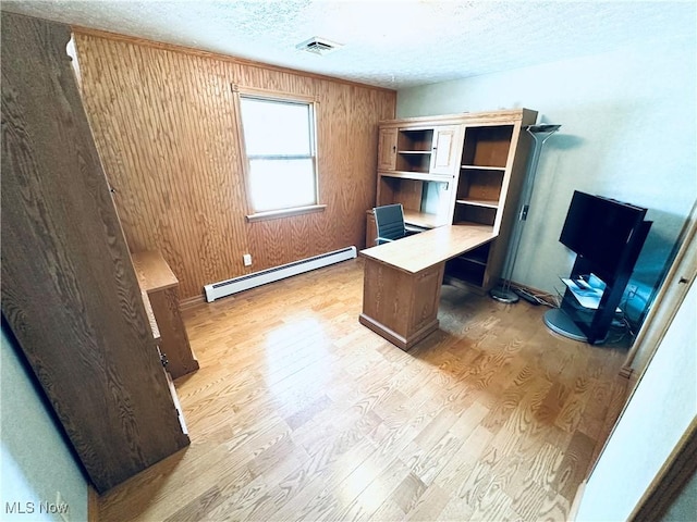 1684 Morris St, Mineral Ridge, OH 44440 - office featuring a baseboard radiator, light wood-style floors, a textured ceiling, and wood walls