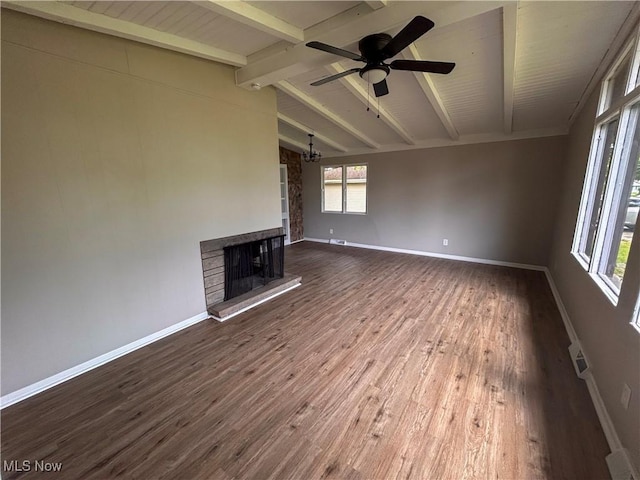 837 Pinecrest Rd, Girard, OH 44420 - unfurnished living room featuring dark wood-type flooring, a multi sided fireplace, and ceiling fan