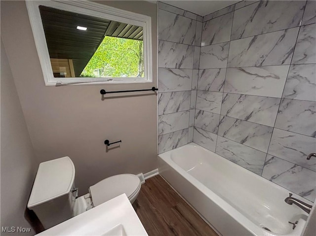 837 Pinecrest Rd, Girard, OH 44420 - full bathroom with wood finished floors and bathing tub / shower combination