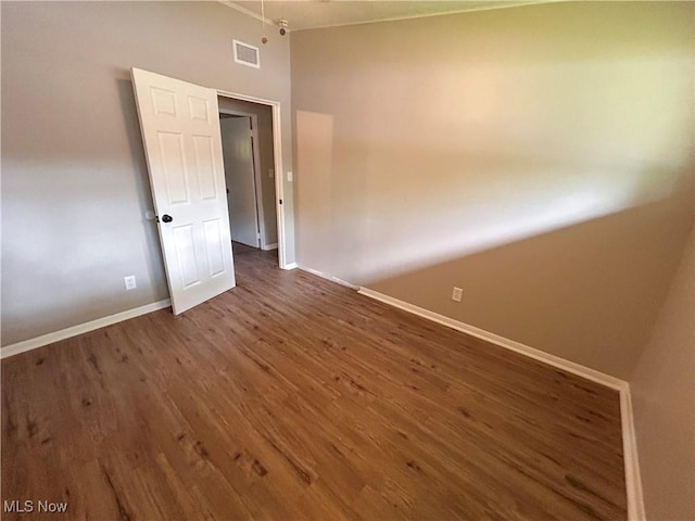 837 Pinecrest Rd, Girard, OH 44420 - unfurnished room with wood finished floors and a high ceiling