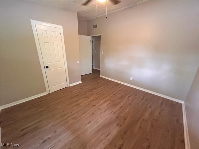 837 Pinecrest Rd, Girard, OH 44420 - unfurnished bedroom with wood finished floors and ceiling fan