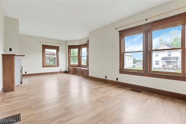 722 Clark St, Cambridge, OH 43725 - unfurnished living room featuring light wood-type flooring and baseboards