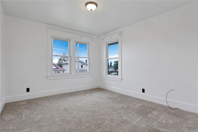 722 Clark St, Cambridge, OH 43725 - carpeted empty room with baseboards