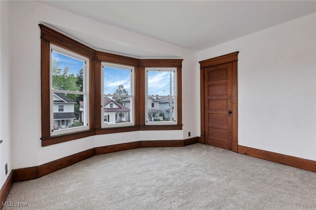 722 Clark St, Cambridge, OH 43725 - unfurnished room with carpet floors and baseboards