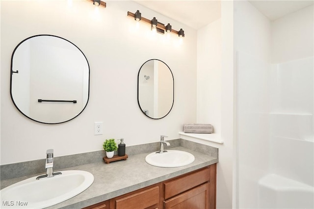 606 Mull Ave Unit 13, Akron, OH 44313 - bathroom featuring double vanity