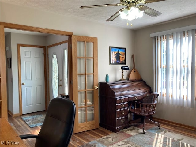 454 Lincoln Ave NW, Carrollton, OH 44615 - office featuring wood finished floors, a ceiling fan, and a textured ceiling