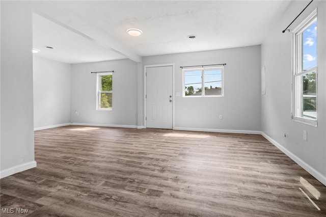 2914 Maple St, Norton, OH 44203 - unfurnished room with wood finished floors and beamed ceiling