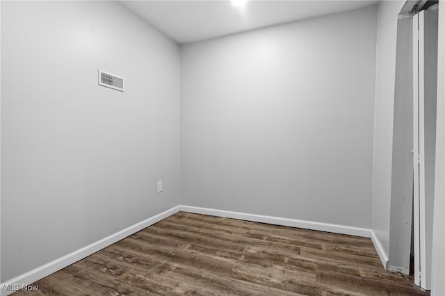 2914 Maple St, Norton, OH 44203 - unfurnished room with dark wood-style floors and baseboards