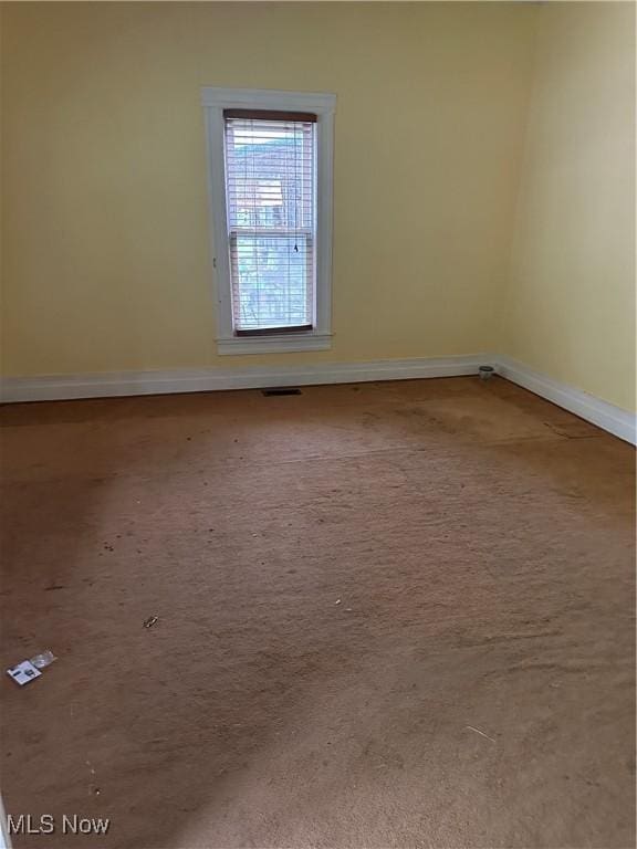 153 River St, Grantsville, WV 26147 - spare room with baseboards and carpet flooring