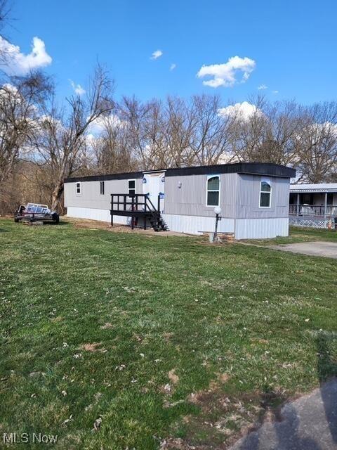 200 Pennock Dr Unit 37, Beverly, OH 45715 - view of front of house with a front yard