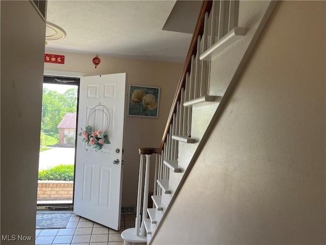 199 Kanawha Rd, Weirton, WV 26062 - tiled foyer entrance featuring stairway