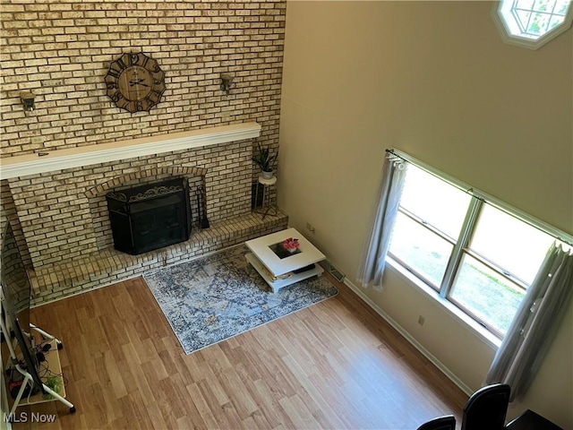 199 Kanawha Rd, Weirton, WV 26062 - unfurnished living room with wood finished floors and a fireplace