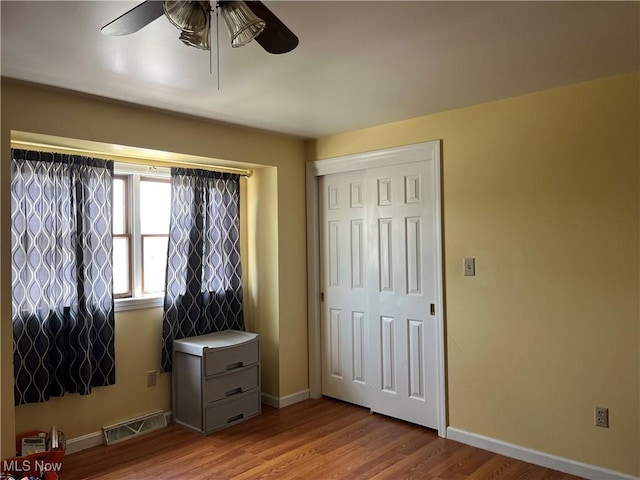 199 Kanawha Rd, Weirton, WV 26062 - bedroom featuring light wood-type flooring, a closet, and a ceiling fan