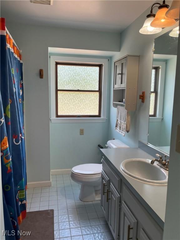 199 Kanawha Rd, Weirton, WV 26062 - bathroom with vanity, tile patterned flooring, and curtained shower