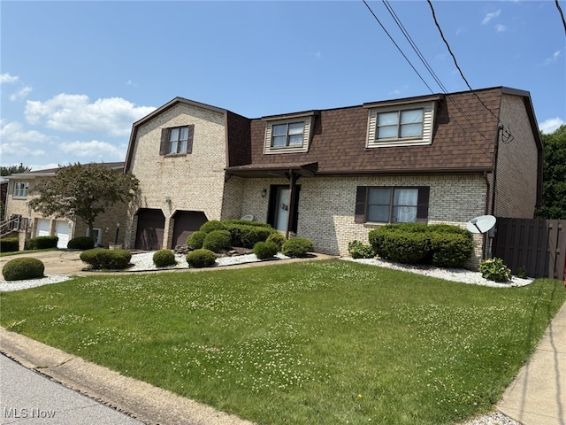 199 Kanawha Rd, Weirton, WV 26062 - view of front of home with brick siding, a shingled roof, and an attached garage