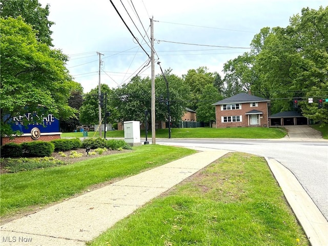 1415 E Main St, Kent, OH 44240 - view of asphalt street featuring curbs