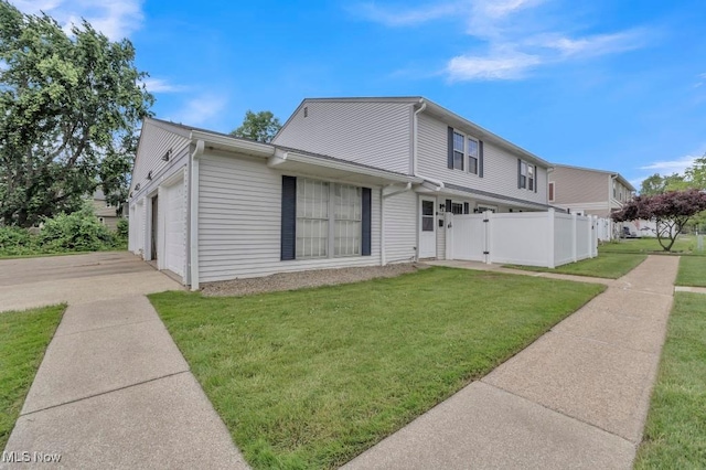 20347 Williamsburg Ct Unit 225B, Middleburg Heights, OH 44130 - view of front facade with a garage and driveway