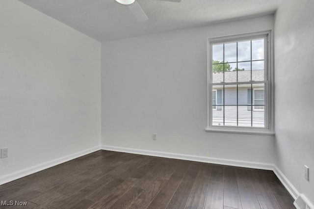 20347 Williamsburg Ct Unit 225B, Middleburg Heights, OH 44130 - spare room with a ceiling fan and dark wood-style flooring