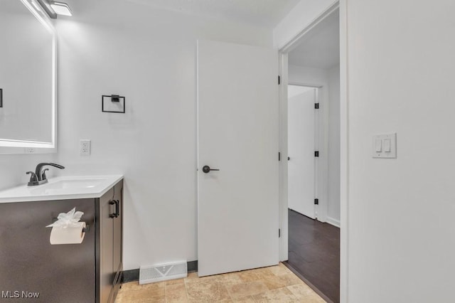 20347 Williamsburg Ct Unit 225B, Middleburg Heights, OH 44130 - bathroom featuring vanity and baseboards