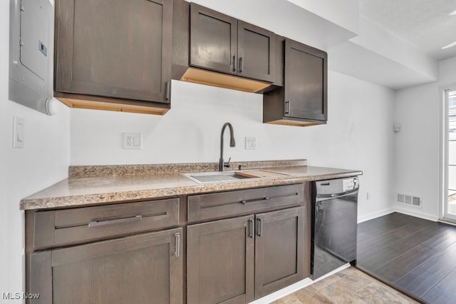 20347 Williamsburg Ct Unit 225B, Middleburg Heights, OH 44130 - kitchen with dishwasher, electric panel, wood finished floors, and light countertops