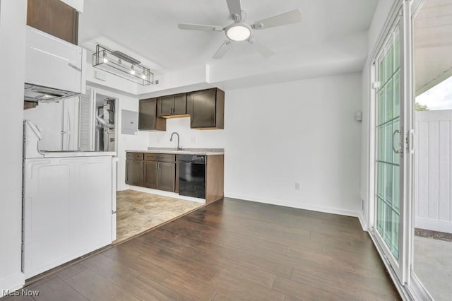 20347 Williamsburg Ct Unit 225B, Middleburg Heights, OH 44130 - kitchen with dishwasher, dark brown cabinets, a ceiling fan, light countertops, and wood finished floors