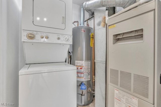 20347 Williamsburg Ct Unit 225B, Middleburg Heights, OH 44130 - washroom with stacked washing machine and dryer, water heater, and heating unit