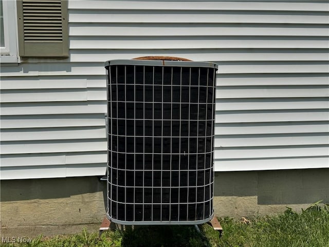 166 Bethesda St, Barnesville, OH 43713 - exterior view of a central AC unit