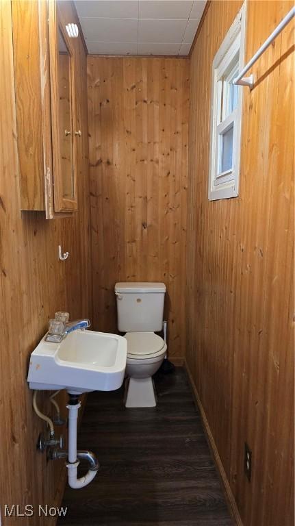 1014 20th St, Parkersburg, WV 26101 - bathroom with wood walls and wood finished floors