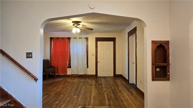 1014 20th St, Parkersburg, WV 26101 - entrance foyer featuring ceiling fan, dark wood-type flooring, and arched walkways