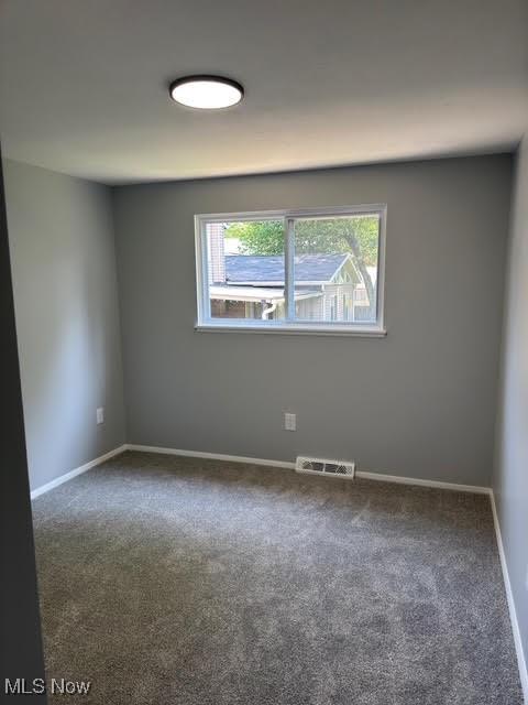 275 Butternut Ln, Berea, OH 44017 - carpeted spare room featuring baseboards