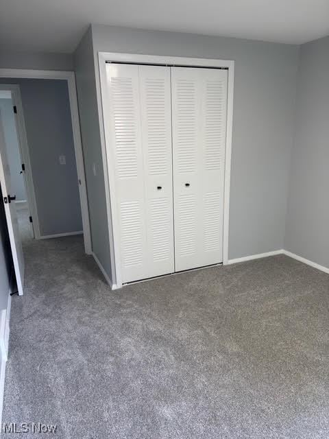 275 Butternut Ln, Berea, OH 44017 - unfurnished bedroom featuring carpet and a closet