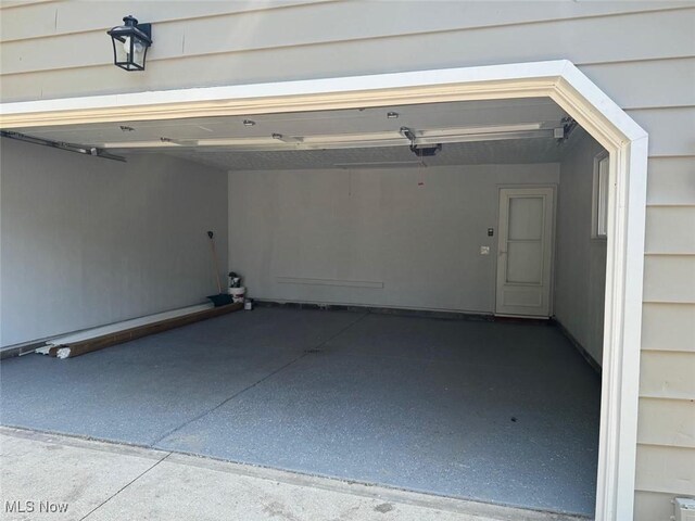 275 Butternut Ln, Berea, OH 44017 - garage with a garage door opener