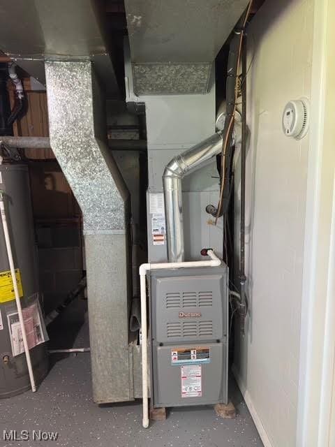 275 Butternut Ln, Berea, OH 44017 - utility room featuring water heater