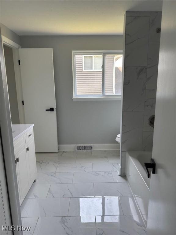 275 Butternut Ln, Berea, OH 44017 - bathroom featuring vanity, marble finish flooring, and  shower combination