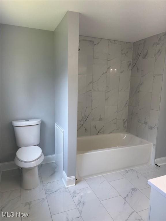 275 Butternut Ln, Berea, OH 44017 - bathroom with marble finish floors, vanity, and bathing tub / shower combination