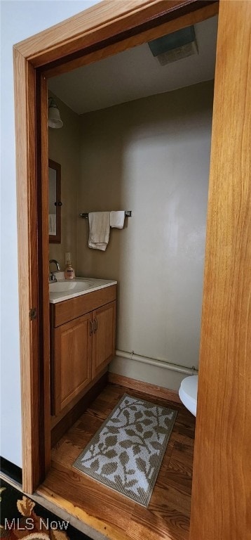 593 Furnace Rd, Conneaut, OH 44030 - half bathroom featuring vanity and toilet