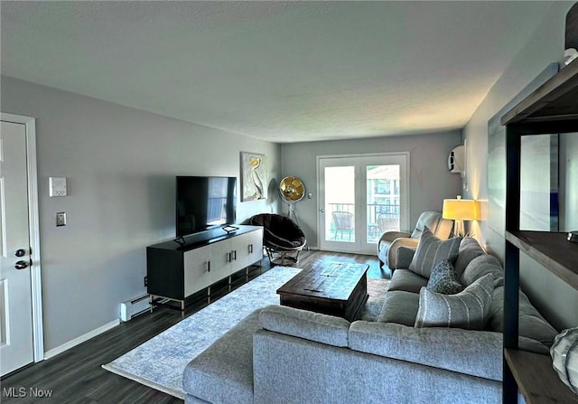 7374 Eisenhower Dr Unit 5, Boardman, OH 44512 - living area with dark wood-style floors and a baseboard heating unit