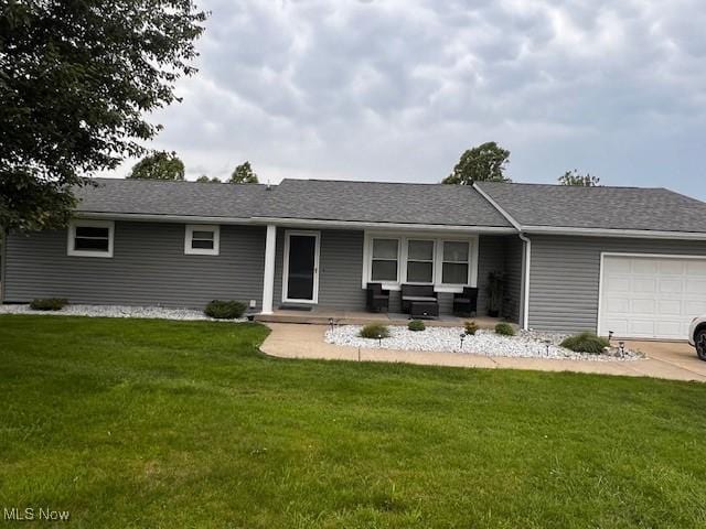 67682 Morristown Flushing Rd, Belmont, OH 43718 - ranch-style house featuring an attached garage and a front lawn