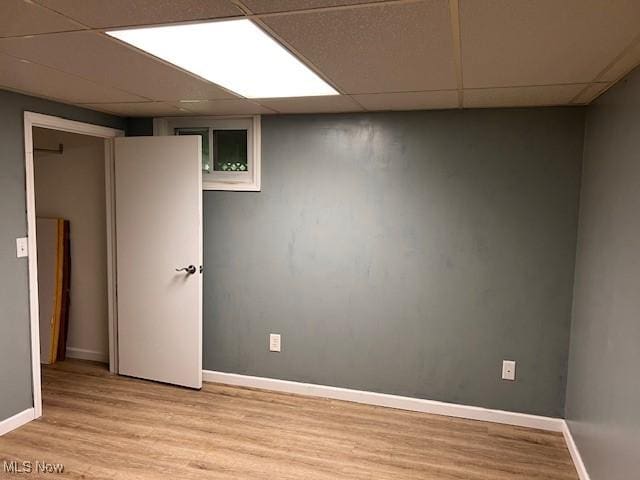67682 Morristown Flushing Rd, Belmont, OH 43718 - finished basement featuring a paneled ceiling and light wood-type flooring