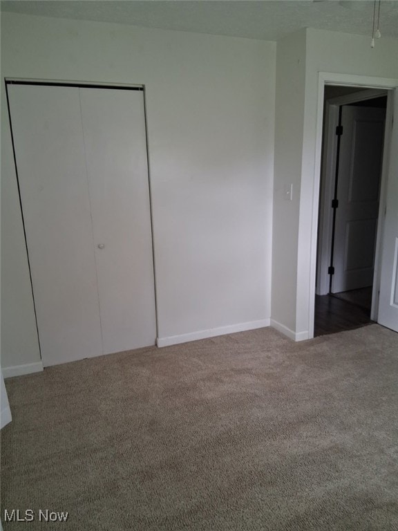 67682 Morristown Flushing Rd, Belmont, OH 43718 - unfurnished bedroom with carpet floors and a closet