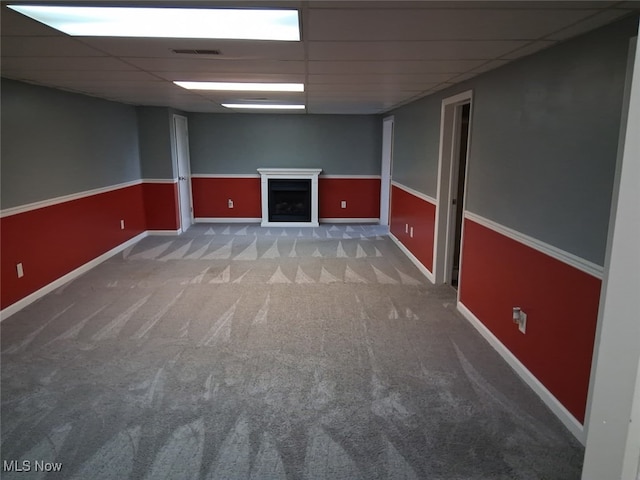 67682 Morristown Flushing Rd, Belmont, OH 43718 - finished below grade area featuring a paneled ceiling, carpet, and a fireplace