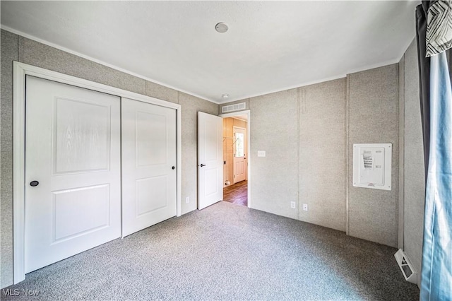8323 Eagle Rd Unit 42, Kirtland, OH 44094 - unfurnished bedroom with ornamental molding, carpet floors, and a closet